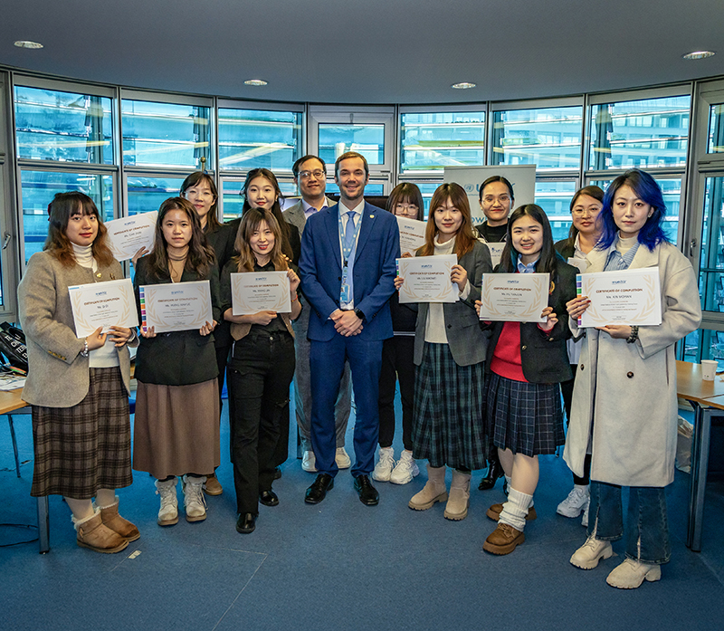 Students from the Beijing Foreign Studies University with their certificates from the UNITAR UN Immersion Programme.