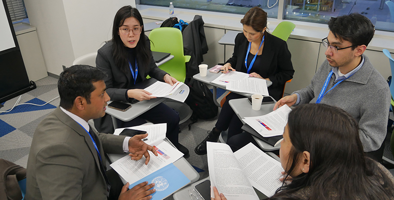 Programme participants with Thai Diplomat Manchulika Wongchai learning about nuclear disarmament.